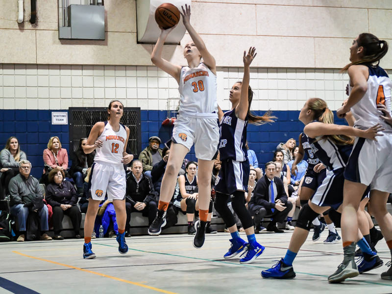 caitlin_wingertzahn_getting_inside_of_the_defense_for_a_layup-1516988404-3669
