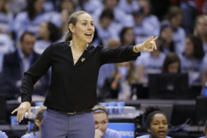 Tufts head coach Carla Berube directs her team as they play Thomas More during the first half of the championship game at the women's NCAA Division III basketball tournament in Indianapolis, Monday, April 4, 2016. (AP Photo/Michael Conroy)